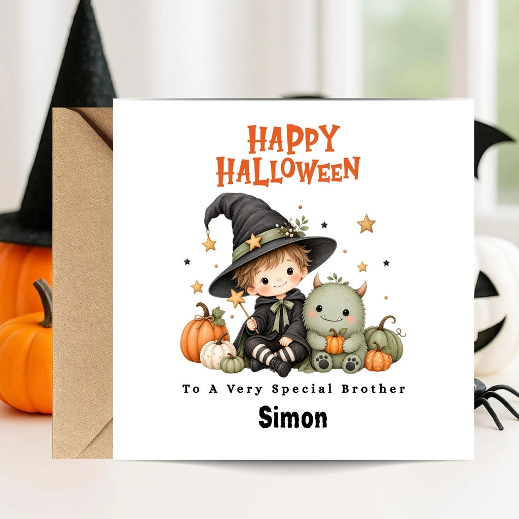 A personalized Halloween greeting card with a white background, featuring a cute cartoon illustration of a child in a witch hat sitting with pumpkins and a small monster. The card reads 'HAPPY HALLOWEEN' and 'To A Very Special Brother Simon'.