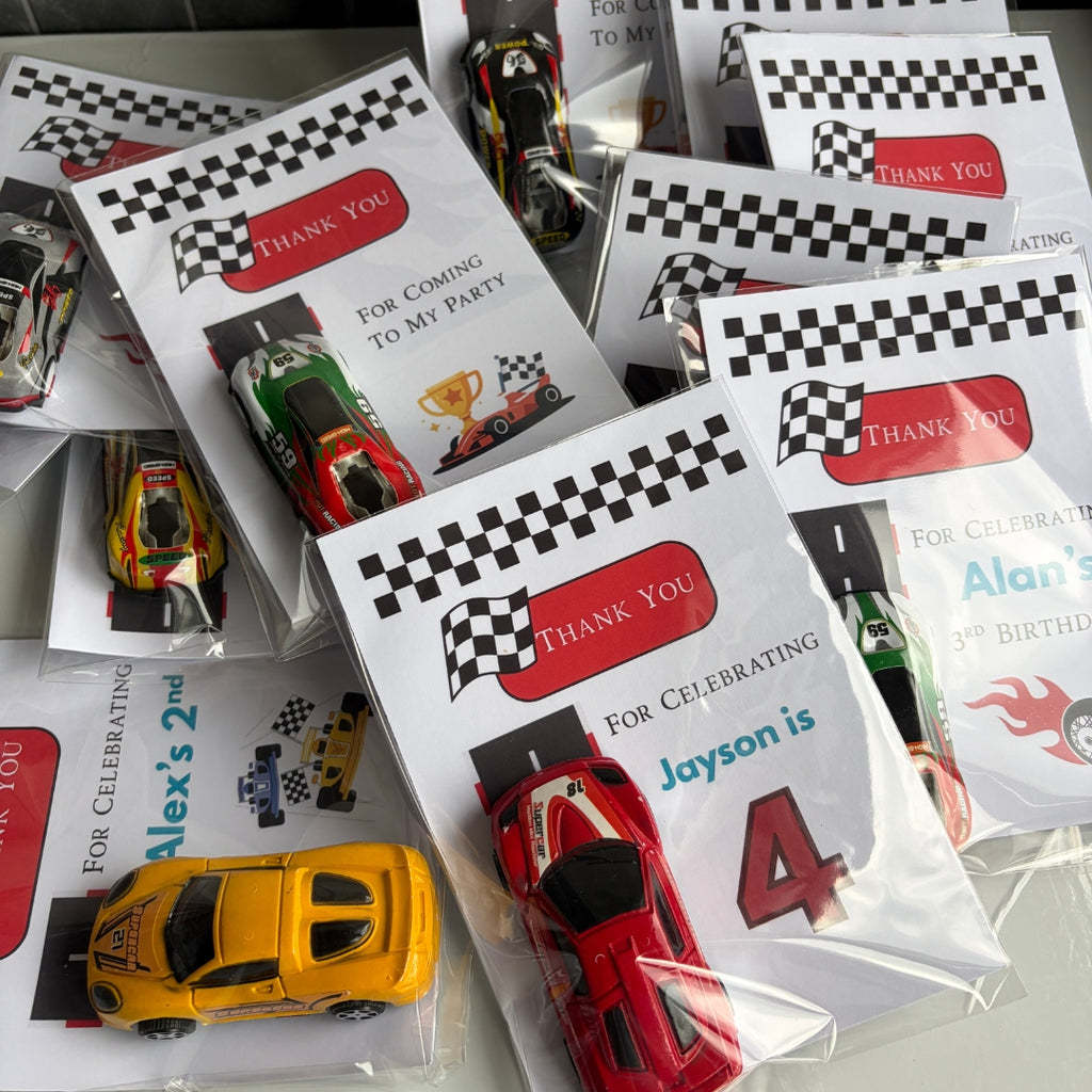 Personalized race car party favors showing custom name and birthday age on thank you cards
